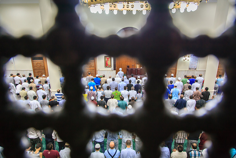 The first Taraweeh  Worshippers gather to pray the first night prayer at a mosque in Doha on the eve of Ramadan in 2013 by Omar Chatriwala