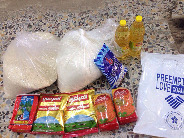 Contents of a food basket delivered as emergency relief to formerly displaced Iraqi families trying to settle in their hometown.