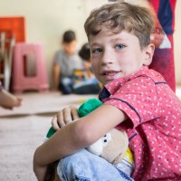 Mohammad at the Child Friendly Space inside the refugee camp, 2018.